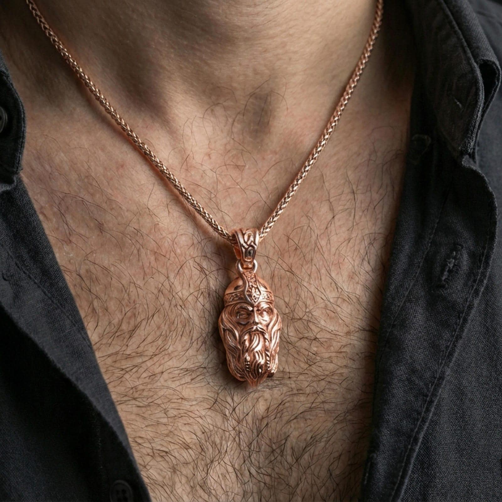 Rose gold plated Viking warrior head pendant necklace worn on the neck, lifestyle wear shot with elegant rosy shine and crisp helmet-and-beard detailing visible.