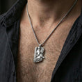 Load image into Gallery viewer, Polished silver Freyr and Gullinbursti pendant necklace worn on the neck, clean lifestyle wear shot capturing bright shine and the detailed Norse god-and-boar relief in natural light.
