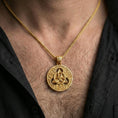 Load image into Gallery viewer, Gold plated Celtic triquetra pendant necklace worn on the neck, lifestyle photo featuring warm tone finish and strong statement amulet presence.
