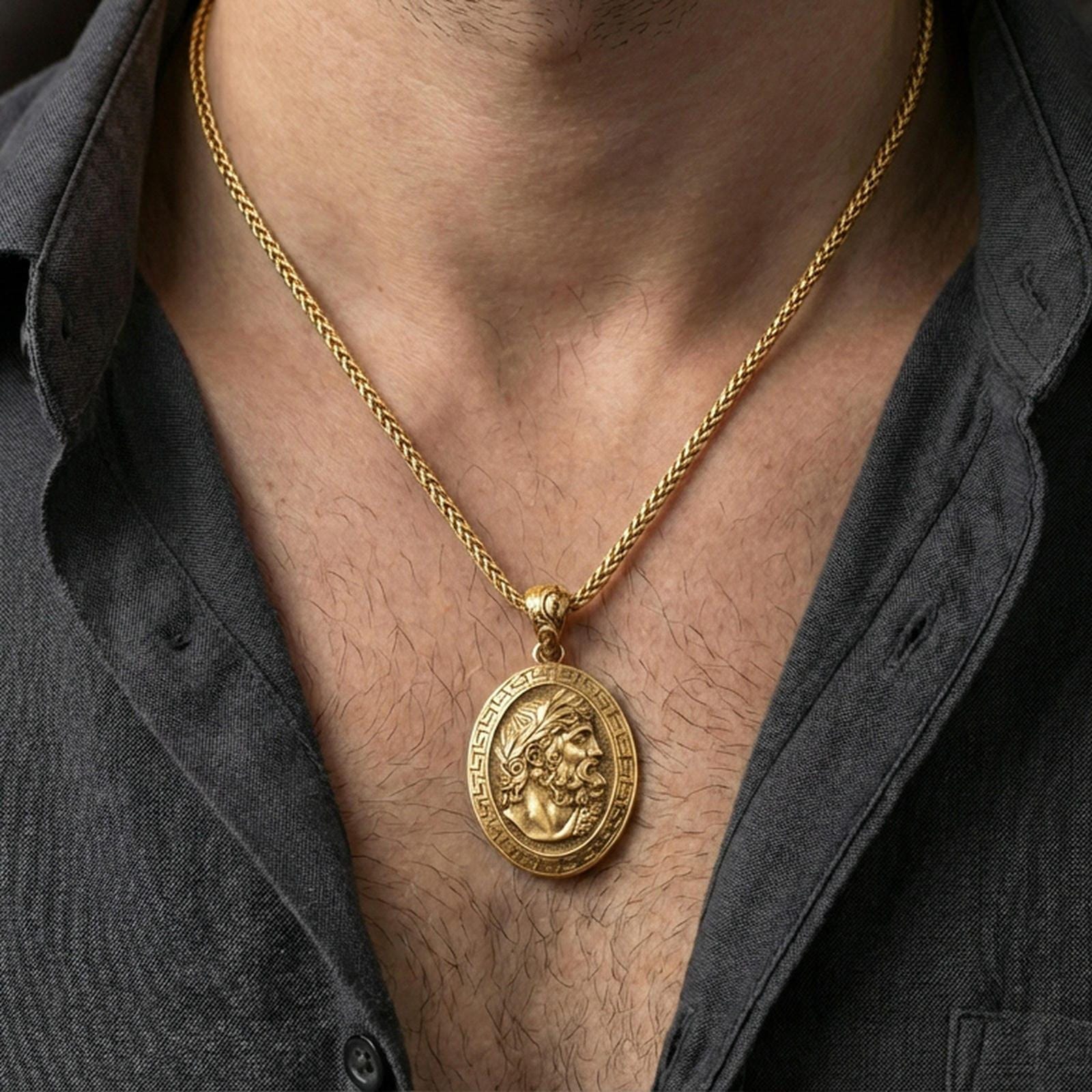 Gold plated Hades coin pendant necklace worn on the neck, lifestyle photo featuring warm tone finish and strong statement medallion presence.