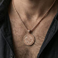 Load image into Gallery viewer, Rose gold plated Urnes style Viking beast pendant necklace worn on the neck, lifestyle wear shot with elegant rosy shine and crisp Viking knotwork detailing visible.
