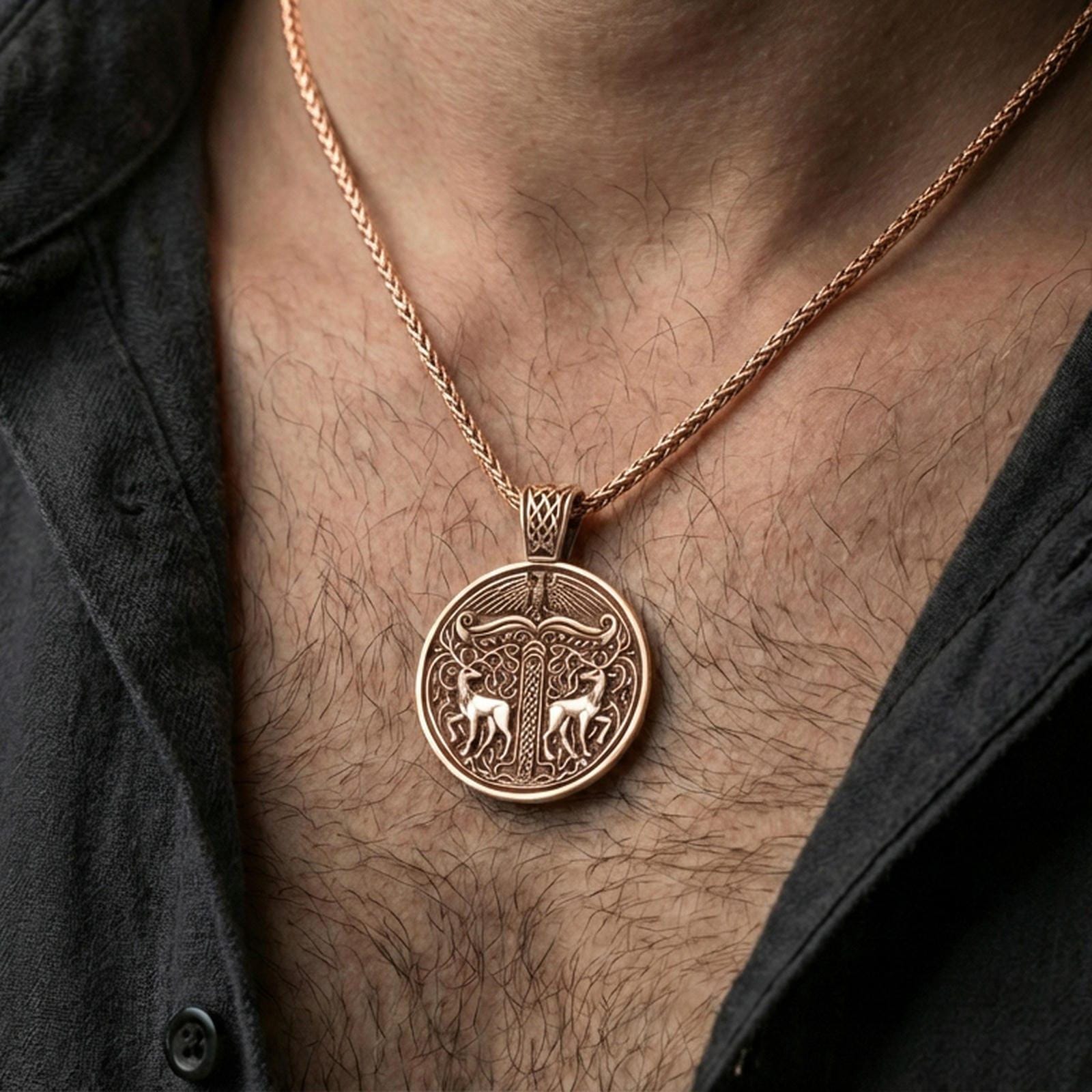 Rose gold plated Viking deer medallion pendant necklace worn on the neck, lifestyle wear shot with elegant rosy shine and crisp deer-and-scroll detailing visible.