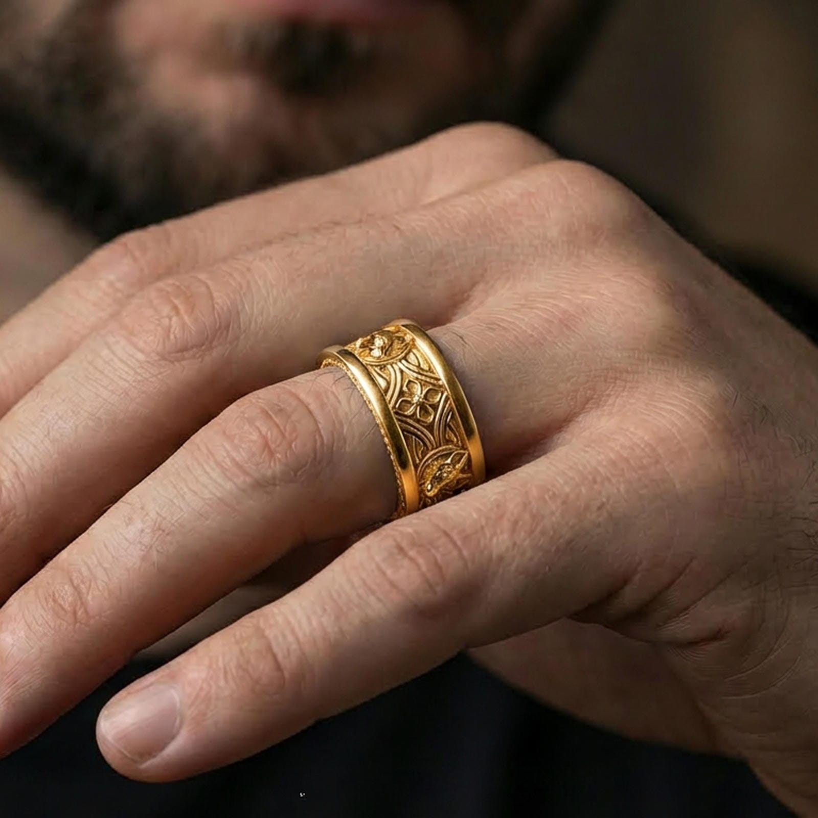 Gold plated fox band ring worn on a finger, lifestyle photo featuring warm tone finish and strong statement band presence.