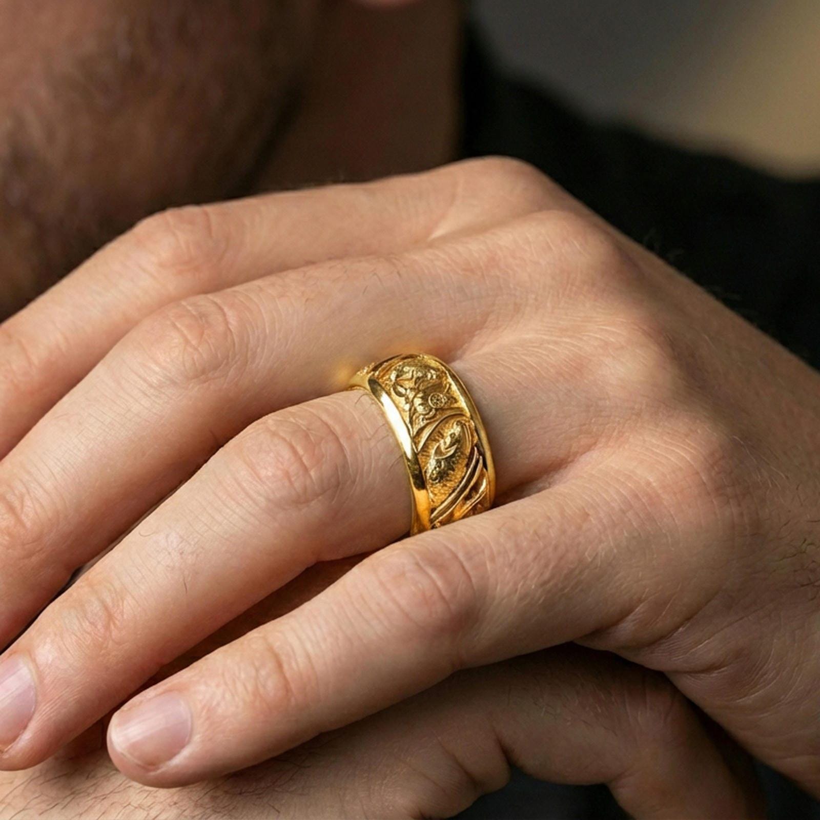 Gold plated koi fish and lotus band ring worn on a finger, lifestyle photo featuring warm tone finish and strong statement band presence.