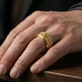 Load image into Gallery viewer, Gold plated oriental dragon band ring worn on a finger, lifestyle photo featuring warm tone finish and strong statement band presence.
