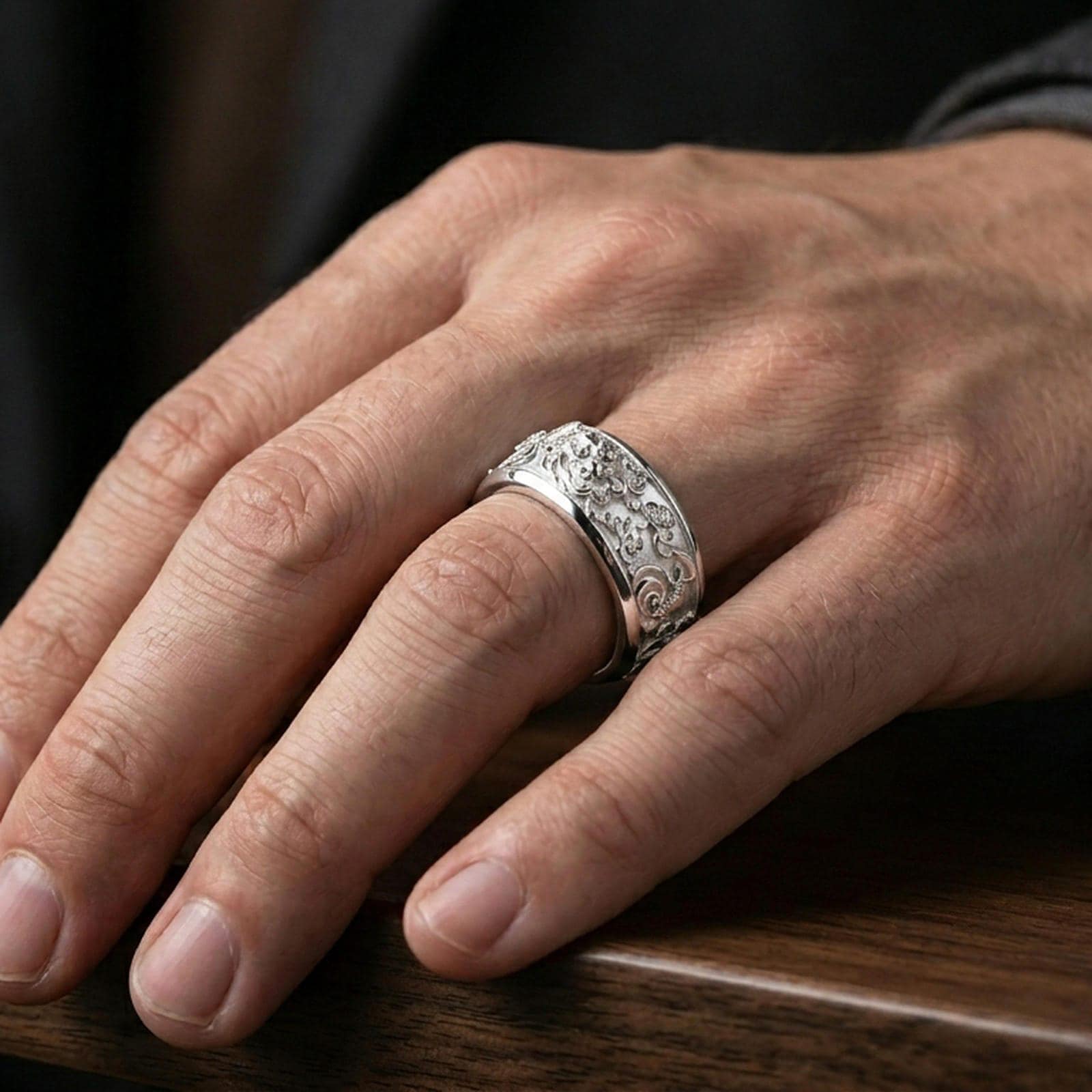 Polished silver oriental dragon band ring worn on a finger, clean lifestyle wear shot capturing bright shine and the detailed dragon relief in natural light.