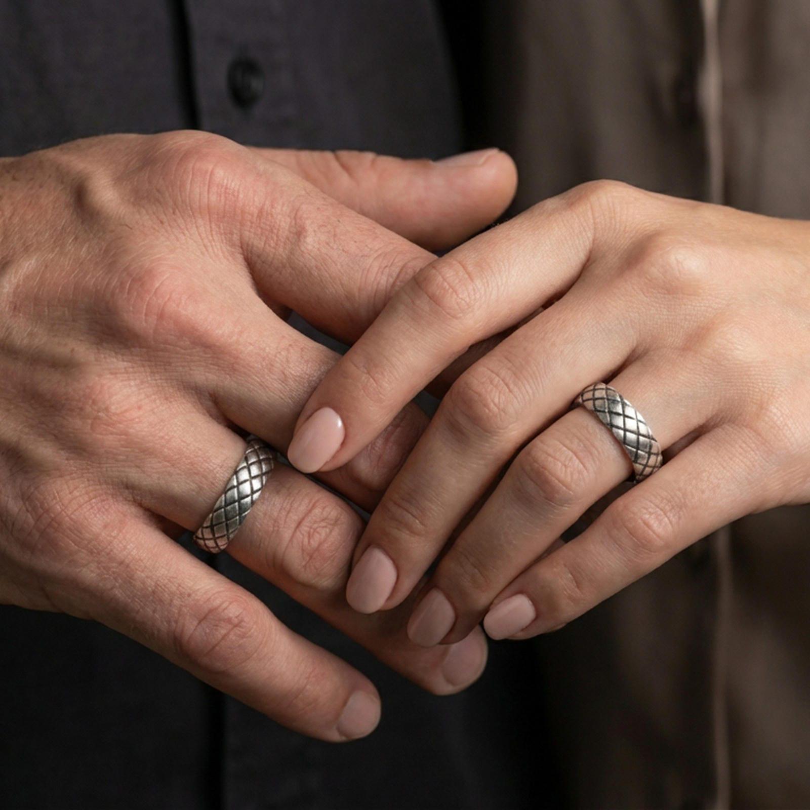 Oxidized woven texture band ring worn on a finger, lifestyle wear photo showing antique contrast and true-to-size basketweave pattern.