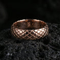 Load image into Gallery viewer, Rose gold plated woven texture band ring on volcanic stone, refined macro shot with soft rosy highlights and clear woven texture definition.
