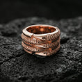 Load image into Gallery viewer, Rose gold plated layered studded band ring on volcanic stone, refined macro close-up capturing soft rose warmth, dimensional layers, and micro-studded texture contrast.
