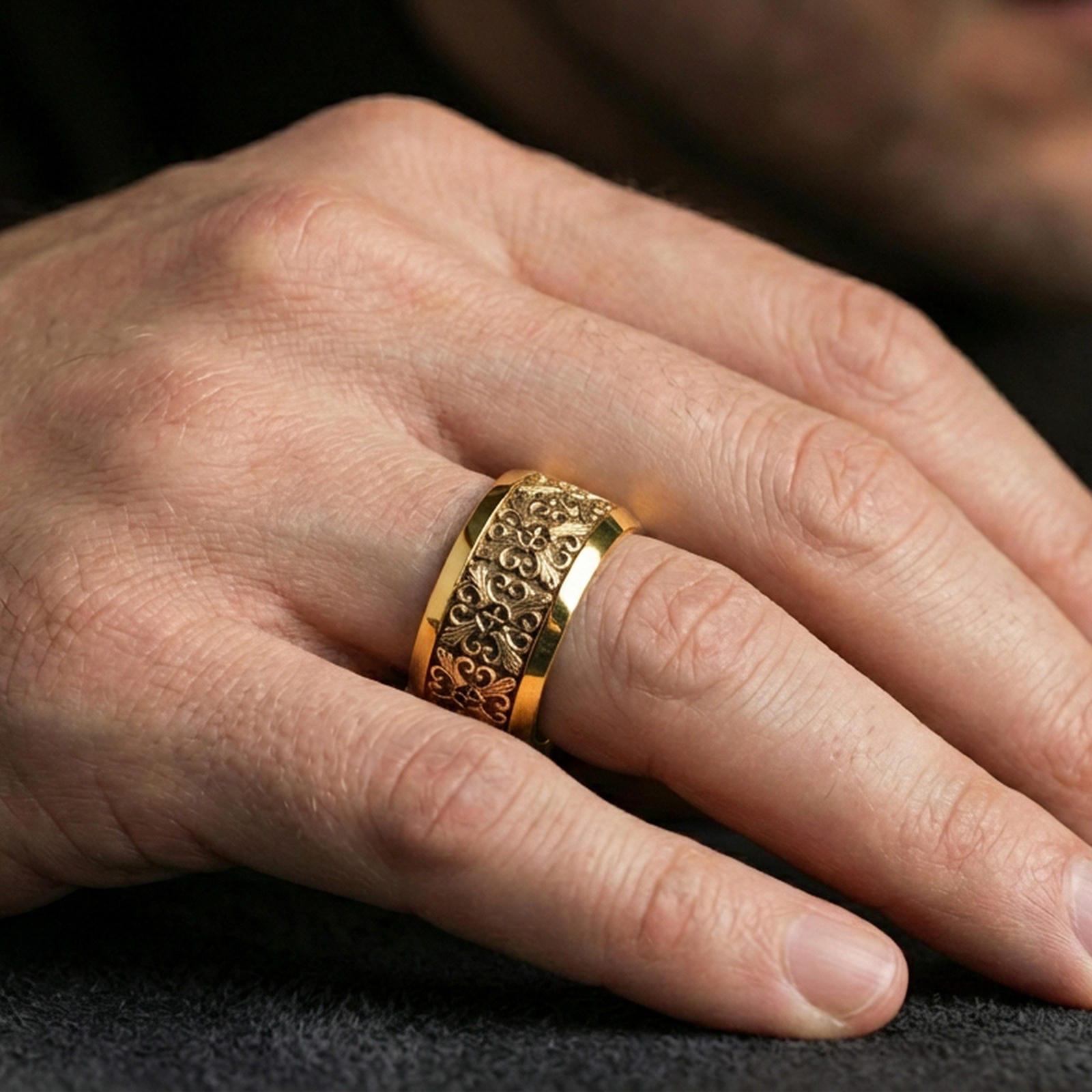 Gold plated cross scrollwork band ring worn on the finger, lifestyle shot showcasing rich golden glow, classic cross symbolism, and premium presence.
