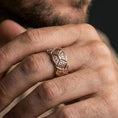 Load image into Gallery viewer, Rose gold plated ornate engraved band ring worn on finger, detailed diamond panels and filigree engraving, elegant lifestyle wear shot.
