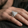 Load image into Gallery viewer, Polished silver all-seeing eye ring on the finger, wearable close-up emphasizing the triangle face and crisp relief details
