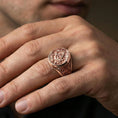 Load image into Gallery viewer, Rose gold plated Masonic signet ring on the finger, close-up lifestyle image focusing on the “G” emblem and ornate band
