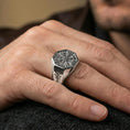 Load image into Gallery viewer, Polished silver finish Vegvisir signet ring on the finger, macro lifestyle image showing the octagonal face and crisp Norse compass lines
