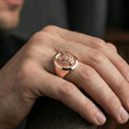 Load image into Gallery viewer, Rose gold plated oni mask signet ring on the finger, close-up showing the bold gothic statement profile
