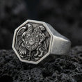 Load image into Gallery viewer, Sterling silver Armenian coat of arms signet ring with an oxidized finish, octagonal face featuring eagle and lion heraldic crest, macro on black volcanic rock
