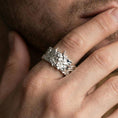 Load image into Gallery viewer, Polished silver oni mask statement ring on finger, crisp demon relief and sculpted details, refined everyday wear close-up.
