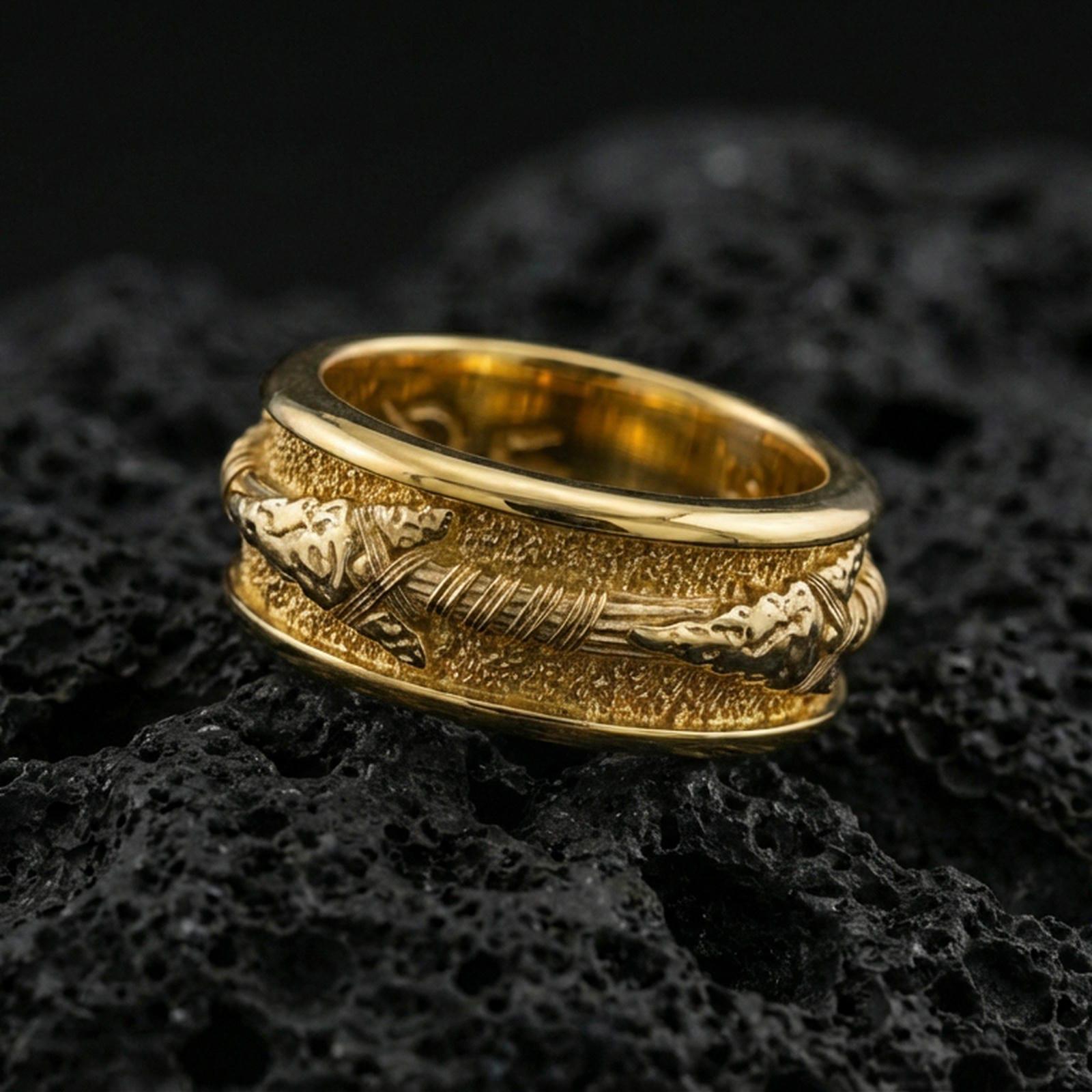 Gold plated arrow spinner band ring on volcanic rock, detailed arrow motif on rotating band with rustic hammered texture, luxury jewelry product photography.