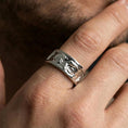Load image into Gallery viewer, Polished silver Benjamin Franklin band ring worn on finger, sharp engraving clarity with a sleek premium sheen and solid unisex profile.
