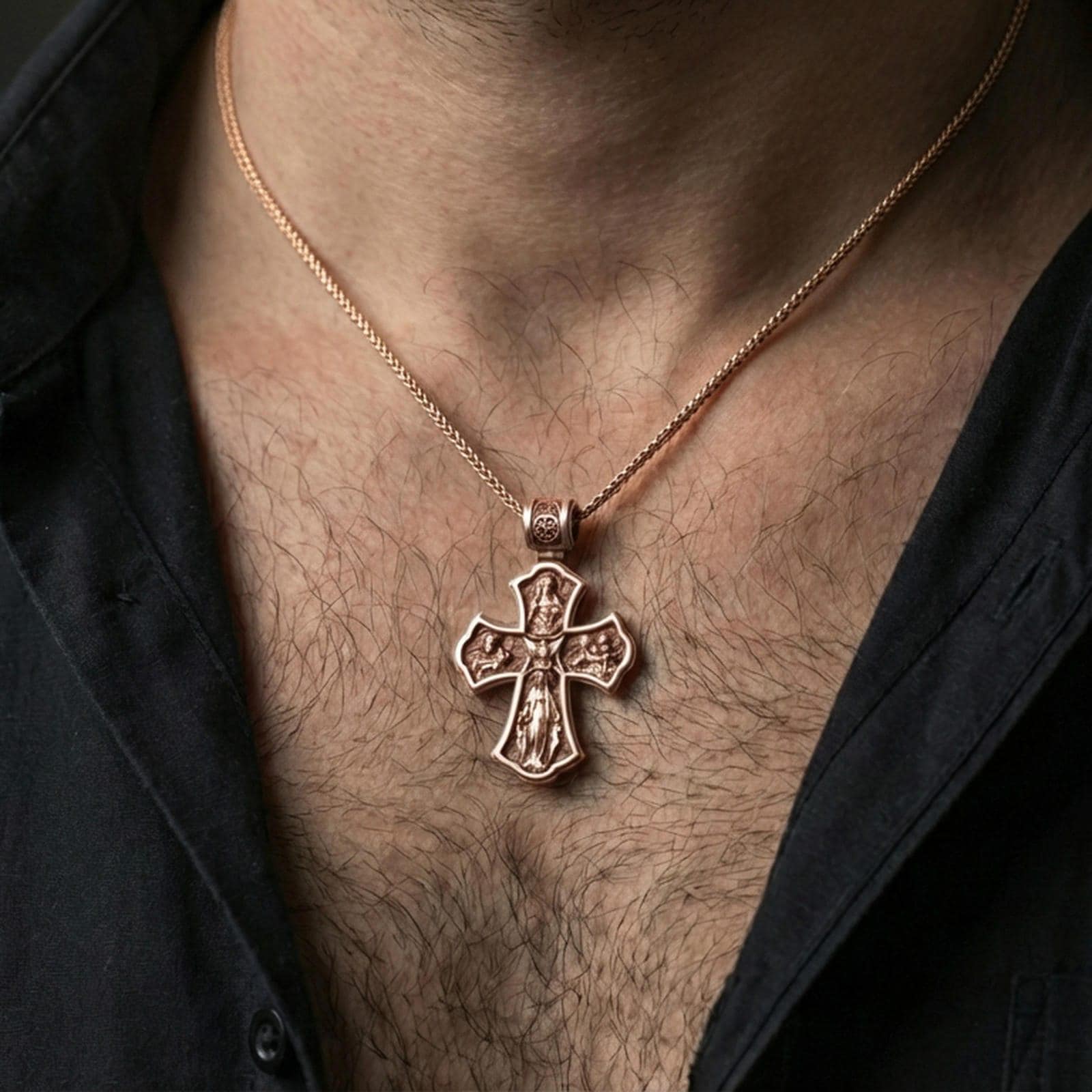 Holy Trinity cross pendant on the neck, back side visible in a lifestyle pose to highlight the second relief scene.
