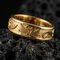 Load image into Gallery viewer, Swan engraved ring displayed on volcanic rock with a gold plated finish, highlighting the wing lines and smooth rounded band.
