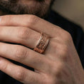 Load image into Gallery viewer, Rose gold plated filigree ring on a finger, elegant metallic glow with vintage scroll engraving and a smooth everyday style.
