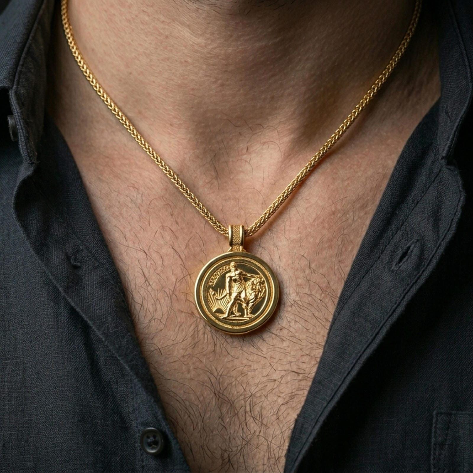 Gold plated Lion of Judah pendant with rotating round form and symbolic lion motif worn on the neck in a premium lifestyle composition