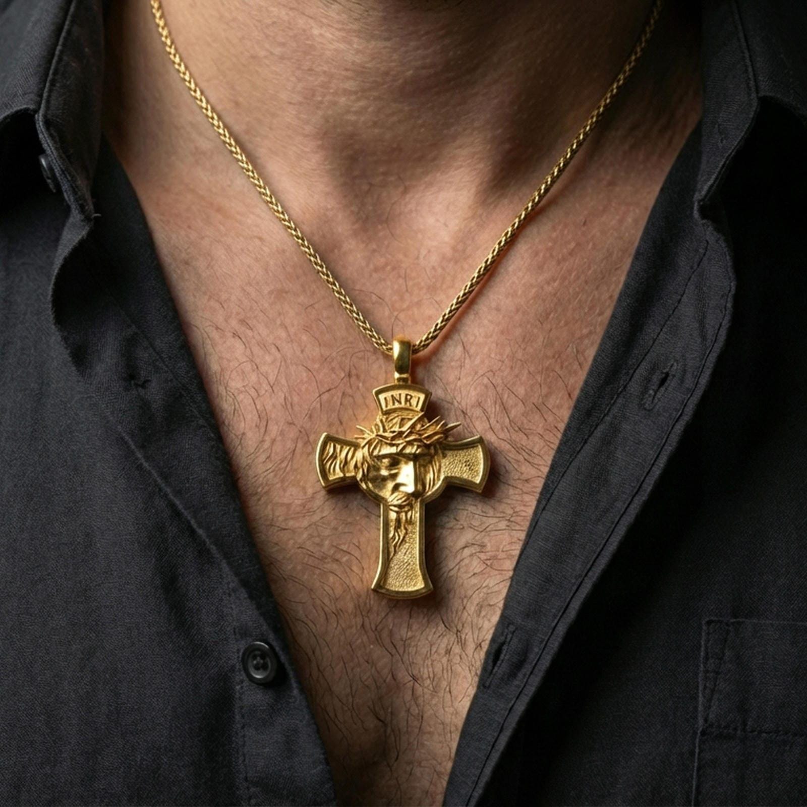 Gold plated Jesus crucifix pendant with crown of thorns and open cross design worn on the neck in a premium lifestyle composition with classic Christian jewelry styling