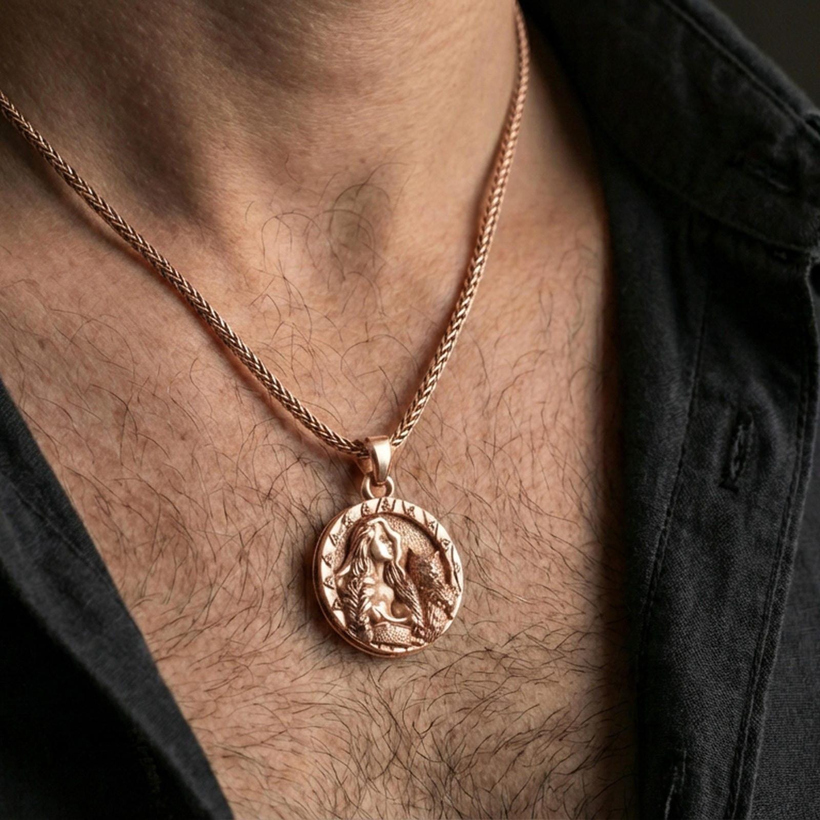 Sterling silver Freya pendant necklace on the neck, macro lifestyle shot showcasing the rose gold plated finish and cat companion motif