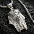 Load image into Gallery viewer, Sterling silver pharaoh head pendant in a polished silver finish, crisp carved headdress lines and facial details, macro on volcanic stone
