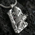 Load image into Gallery viewer, Polished silver Njord Norse sea god pendant necklace on textured volcanic rock, crisp macro product photo emphasizing sharp sculpted details, clean edges, and the engraved runes at the bottom.

