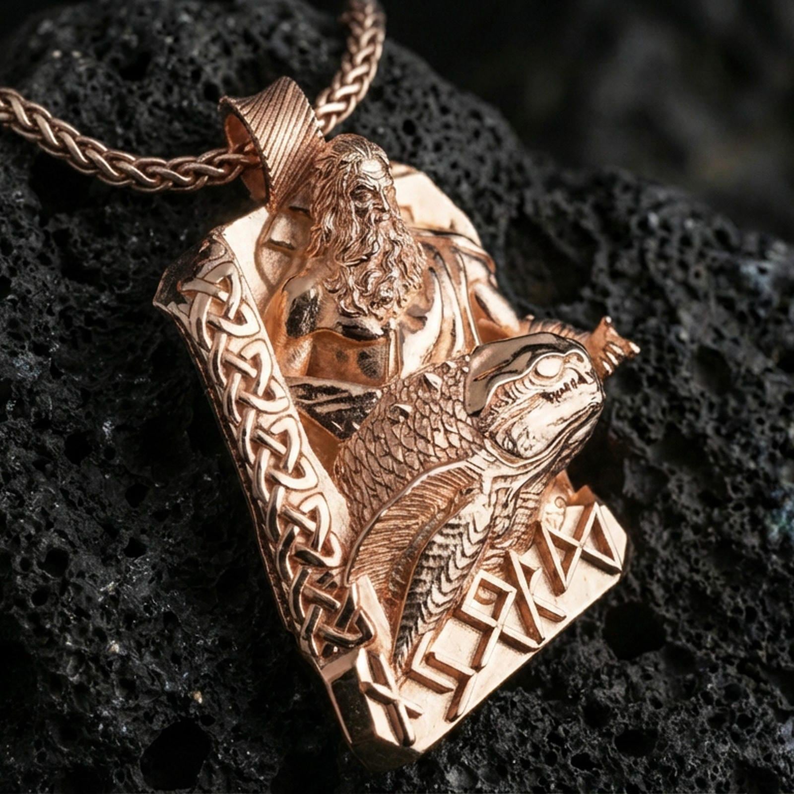 Rose gold plated Njord Norse sea god pendant necklace on textured volcanic rock, centered studio-style close-up showcasing soft rosy glow and intricate Norse relief detailing with visible rune symbols.