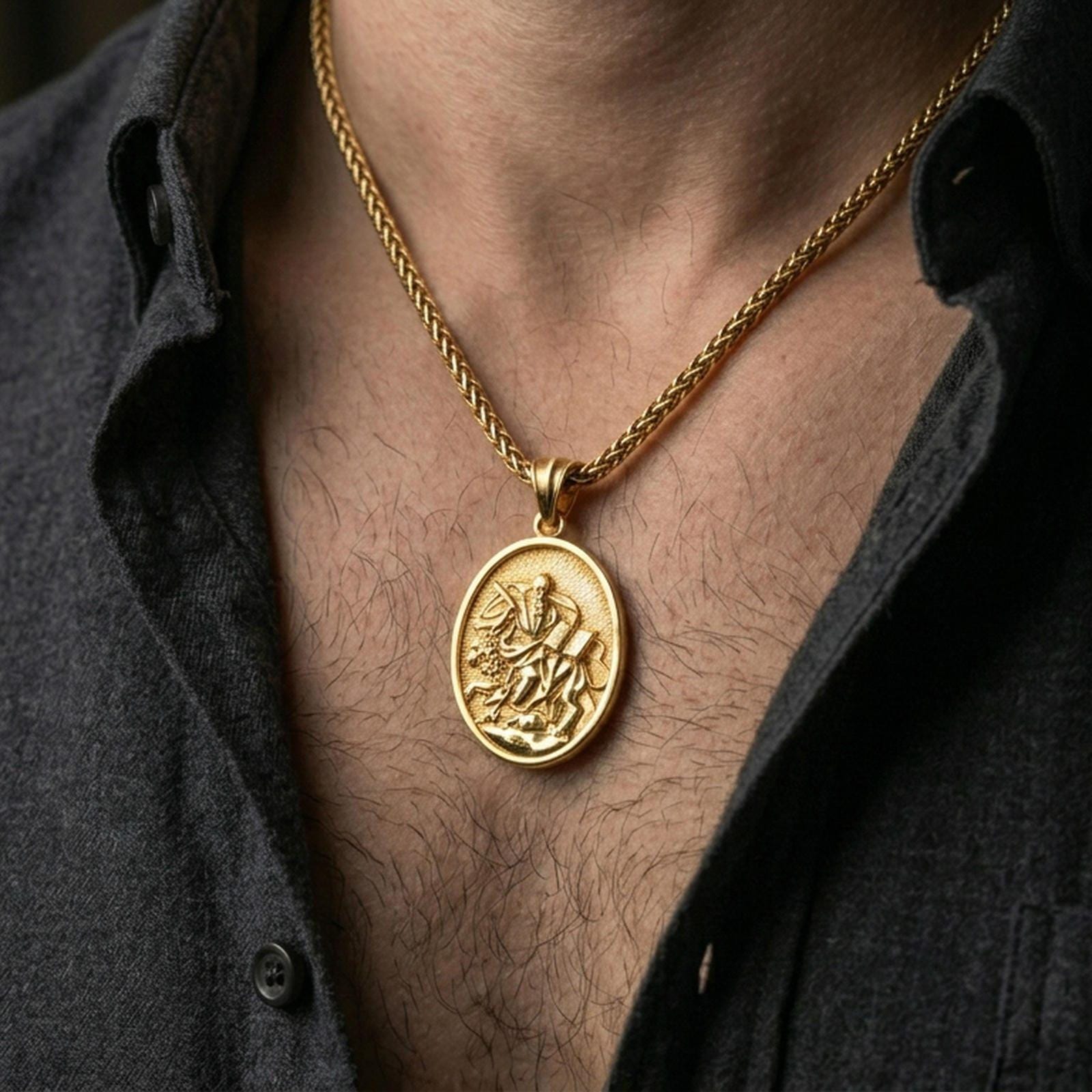 Gold plated oval saint necklace with lion companion and scripture detail worn on the neck in a premium lifestyle composition with classic devotional jewelry styling