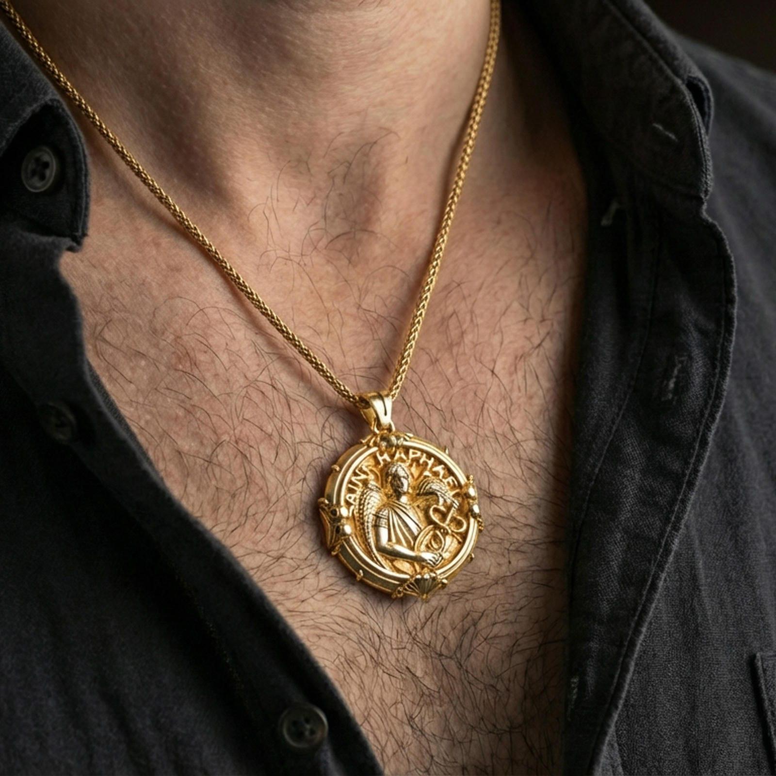 Gold plated Saint Raphael necklace with winged healer motif worn on the neck in a premium lifestyle composition with classic Christian jewelry styling