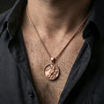 Load image into Gallery viewer, Rose gold plated koi fish medallion pendant necklace worn on the neck, lifestyle wear shot with elegant rosy shine and crisp koi fish engraving visible.
