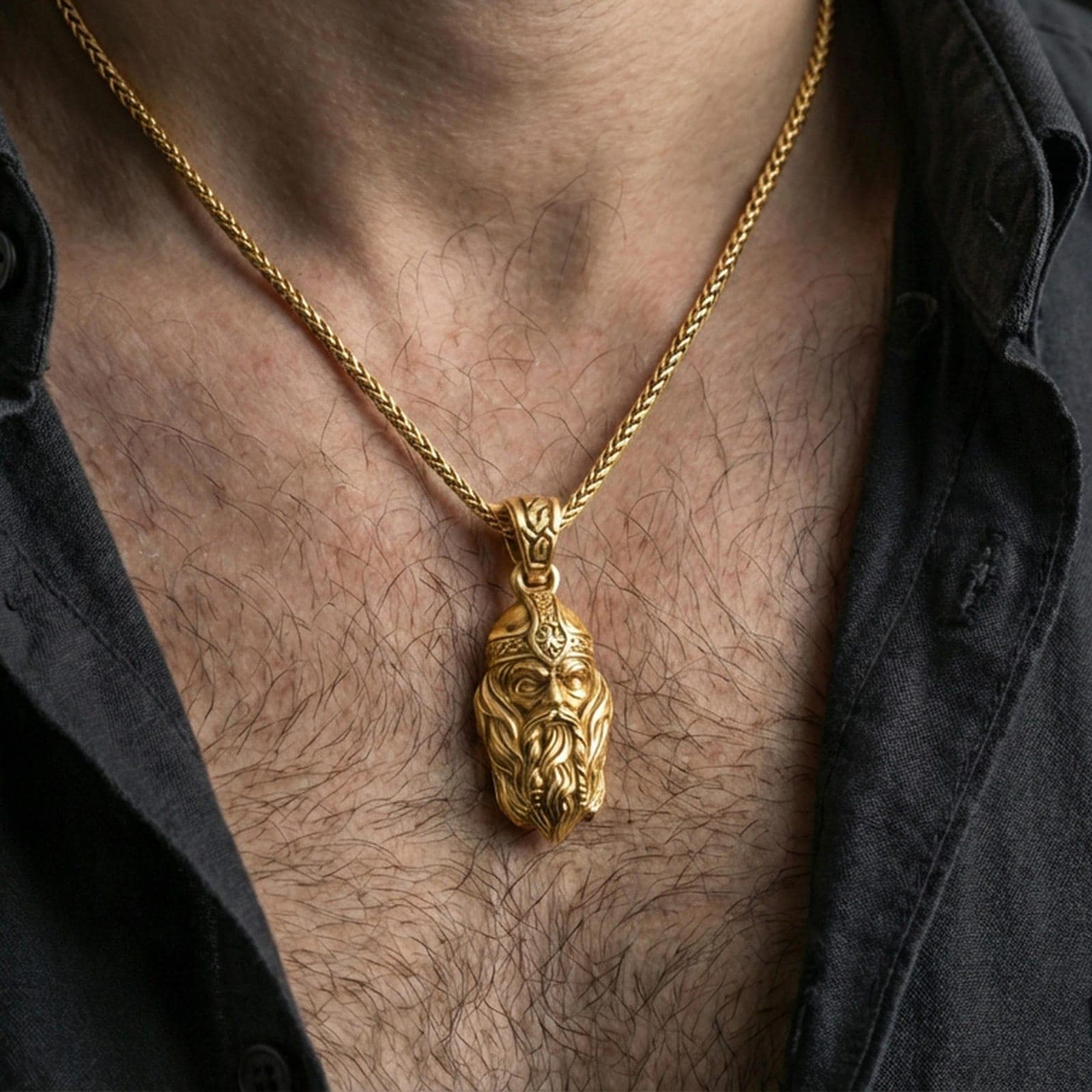 Gold plated Viking warrior head pendant necklace worn on the neck, lifestyle photo featuring warm tone finish and strong statement pendant presence.