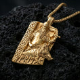 Load image into Gallery viewer, Gold plated Freyr and Gullinbursti pendant necklace on textured volcanic rock, premium close-up with warm reflective shine across the Norse figure, raised runes, and detailed boar relief.
