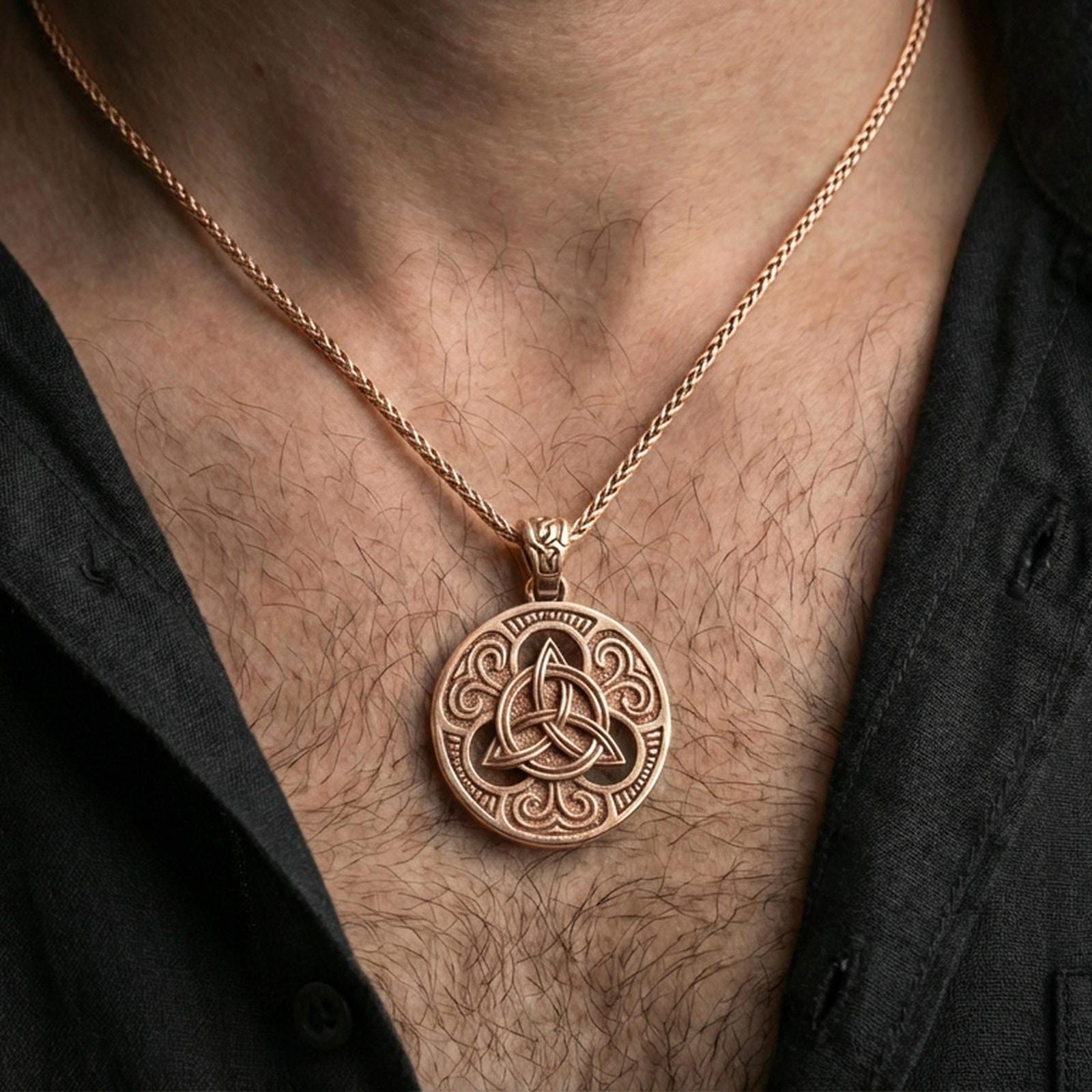 Rose gold plated Celtic triquetra pendant necklace worn on the neck, lifestyle wear shot with elegant rosy shine and crisp Celtic knot detailing visible.
