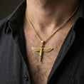 Load image into Gallery viewer, Gold plated winged Isis goddess pendant necklace worn on the neck, lifestyle photo featuring warm tone finish and strong statement pendant presence.
