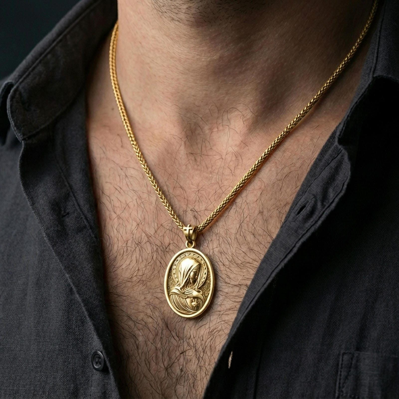 Gold plated Immaculate Heart pendant with veiled Madonna figure worn on the neck in a premium lifestyle composition with classic Christian jewelry styling