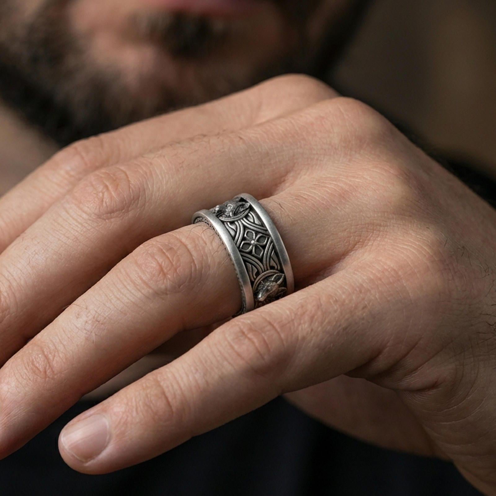 Oxidized fox band ring worn on a finger, lifestyle framing showing realistic scale and bold vintage contrast in a natural hand pose.