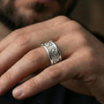 Load image into Gallery viewer, Polished silver fox band ring worn on a finger, clean lifestyle wear shot capturing bright shine and the detailed fox head relief in natural light.
