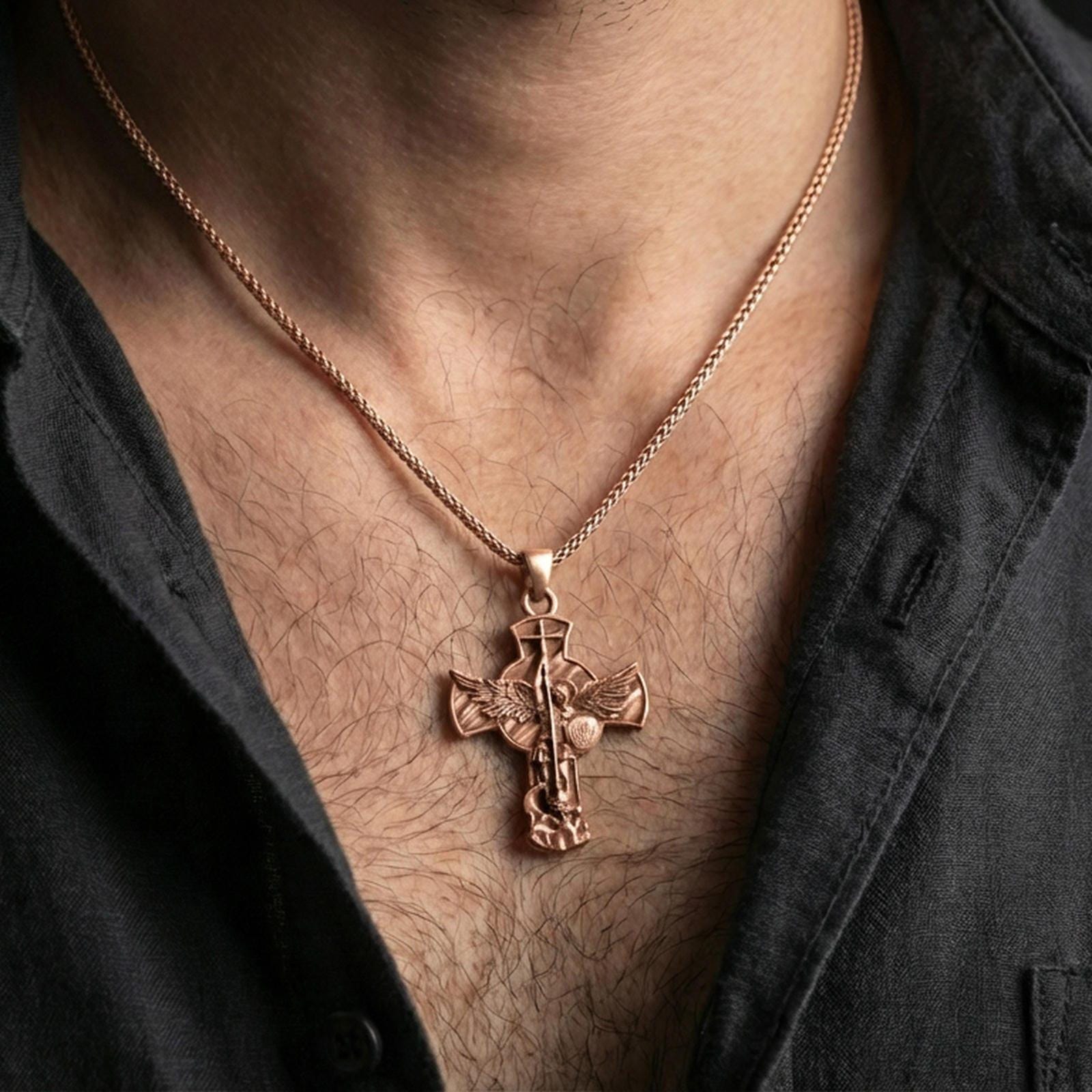 Rose gold plated Archangel Michael pendant with cross form, winged guardian relief, and shield detail worn on the neck in a refined lifestyle shot with a warm and powerful presentation