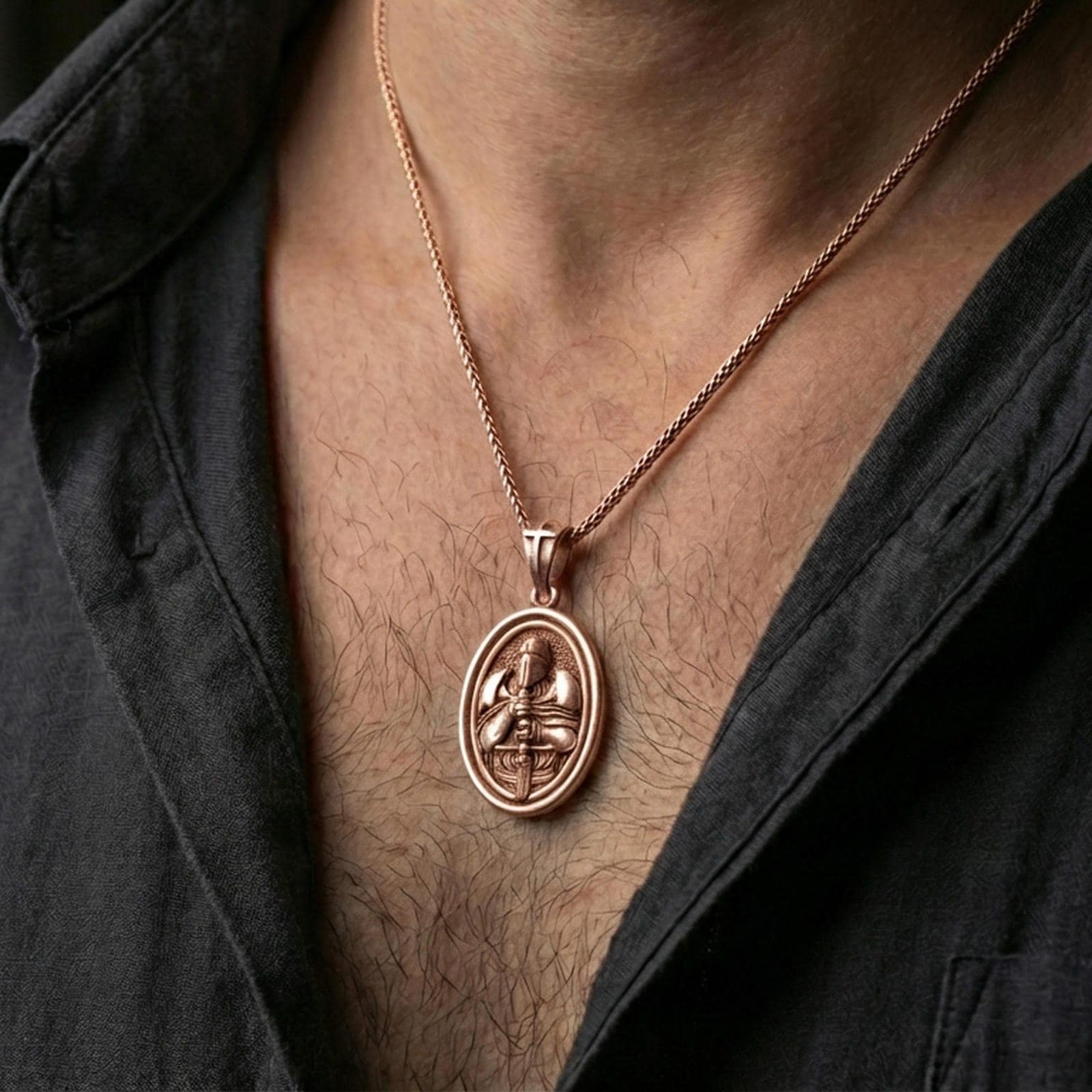 Rose gold plated crusader knight necklace with helmeted warrior relief and sword element worn on the neck in a refined lifestyle shot with a warm and powerful presentation