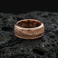 Load image into Gallery viewer, Rose gold plated lizard skin spinner ring on volcanic stone, refined macro close-up showcasing soft rose sheen over the scaled pattern and clean comfort-fit profile.
