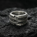 Load image into Gallery viewer, Oxidized sterling silver layered studded band ring on volcanic stone, macro close-up highlighting dotted texture panels and bold industrial ridge lines.

