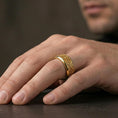 Load image into Gallery viewer, Ornate scrollwork sterling silver band ring worn on a finger, gold plated look for a bold statement while preserving the fine ornamental engraving.
