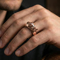 Load image into Gallery viewer, Sterling silver rhino head ring worn on a finger, rose gold plated finish offering a refined warm tone with clear rhino head detail and depth.
