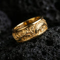 Load image into Gallery viewer, Gold plated dragon and koi fish band ring on volcanic rock, high-relief Japanese motif with engraved texture, luxury jewelry product photography.
