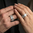 Load image into Gallery viewer, Polished silver industrial railway band ring on finger, crisp rivet borders and track pattern detail, refined everyday wear close-up.
